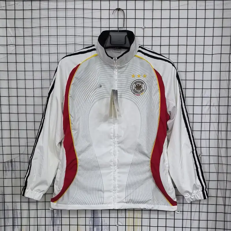 Corteiz Germany National Team White Soccer Track Jacket with Red Yellow Black Accents & Team Badge