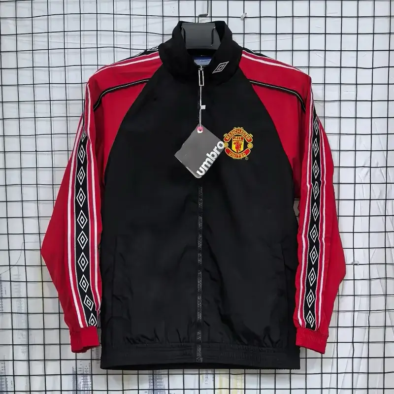 Corteiz Manchester United Black Red Track Jacket with Team Badge & Diamond Stripes